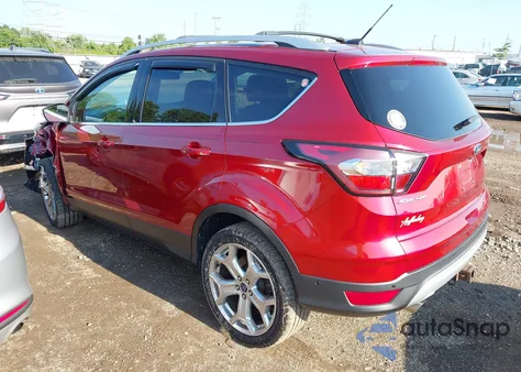 2017 Ford Escape Titanium z USA, uszkodzony, nr VIN 1FMCU0J92HUA81405